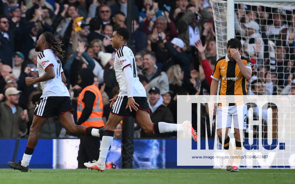 Fulham v Hull City Premier League Fulhams Alex Iwobi celebrates scoring their first goal as Hull City s Lewie Coyle looks on during the Premier League match at Craven Cottage, London 17 10 2026 UK Newspapers OUT