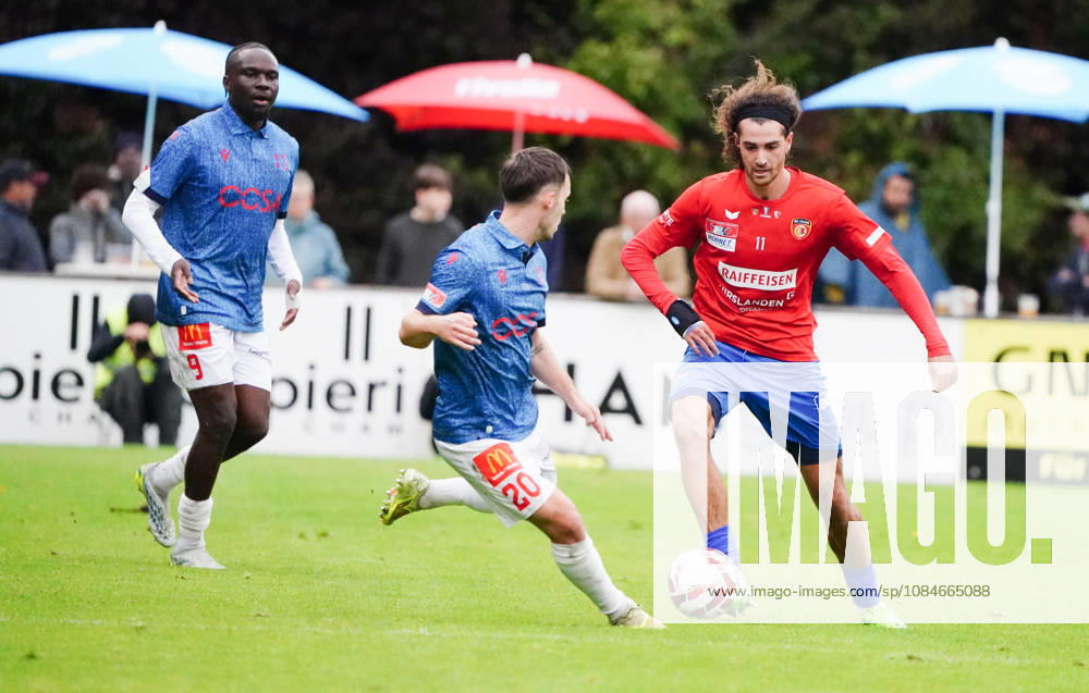 Cham, Switzerland; Men s Soccer, 2026–2027 Season, Swiss Cup, Round 2, SC Cham vs. FC Sion, 0–2; Photo: Josias Lukembila and Nias Hefti (FC Sion) vs. Marin Wiskemann (SC Cham); Reaction