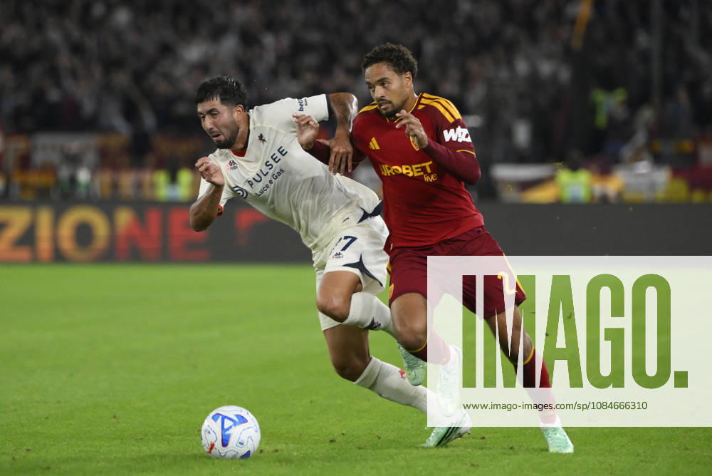 Roma’s Wesley fights for the ball with Genoa’s Mikael Egill Ellertsson during the Serie A Enilive soccer match between AS Roma and Genoa at the Rome s Olympic stadium, Italy - October 17, 2026. - Soccer.