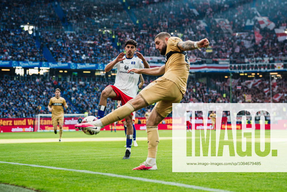 Bundesliga Match: Hamburger SV vs. VfB Stuttgart, October 17, 2026. Jeff Chabot (VfB Stuttgart, No. 24) kicks the ball toward Martin Adeline (Hamburger SV, No. 5). Soccer, 1 Bundesliga, Matchday 6: Hamburger SV vs. VfB Stuttgart on October 17, 2026, at the Volksparkstadion, Hamburg. DFL regulations prohibit any use of photographs as image sequences and or quasi-video.