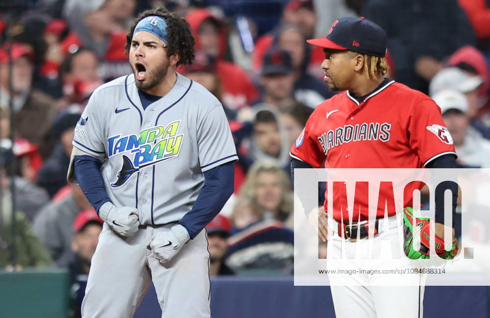 Tampa Bay Rays Jonathan Aranda (8) celebrates on third base next to Cleveland Guardians third baseman Jose Ramirez (11) after hitting a two-rbi single then advancing to third on a fielding error by Guardians right fielder Chase DeLauter in the seventh inning during game four of the MLB, Baseball Herren, USA American League Championship Series at Progressive Field in Cleveland, Ohio, on Saturday, October 17, 2026. CLE20261017730 AARONxJOSEFCZYK