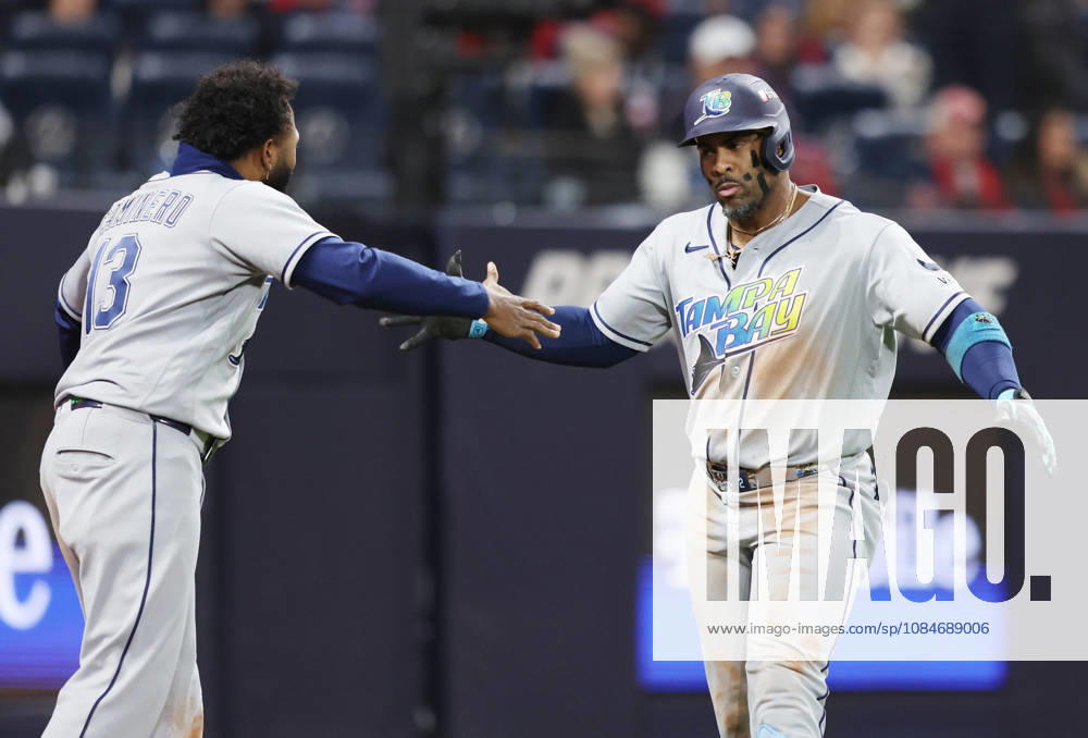 Tampa Bay Rays designated hitter Yandy Diaz (2) celebrates with Junior Caminero (13) after hitting a two-run home run against the Cleveland Guardians in the ninth inning in game four of the MLB, Baseball Herren, USA American League Championship Series at Progressive Field in Cleveland, Ohio, on Saturday, October 17, 2026. CLE20261017746 AARONxJOSEFCZYK