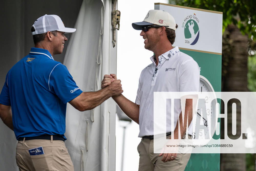 Paul CASEY from England greets USAÃ¢â‚¬â ¢s Andy OGLETREEÃ¢â‚¬â ¢ (R) Macau Open Golf 2026 Final Round. Macau Open Golf 2026 Final Round - ZUMAr144 20261018_zap_r144_009