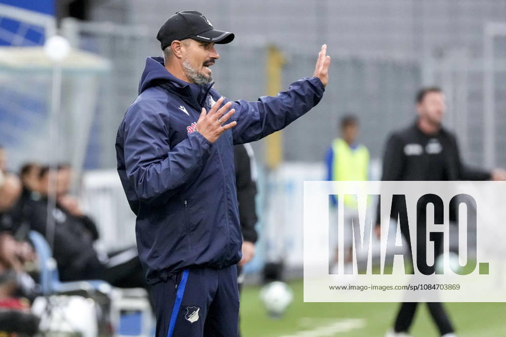 Stefan Kleineheismann, coach and head coach of TSG II, gives instructions, gesturing with his arms; single frame, single photo, action, October 18, 2026, Sinsheim, Germany, soccer, 3rd League, TSG 1899 Hoffenheim II vs. SC Verl; DFB and DFL regulations prohibit any use of photographs as image sequences and or quasi-video