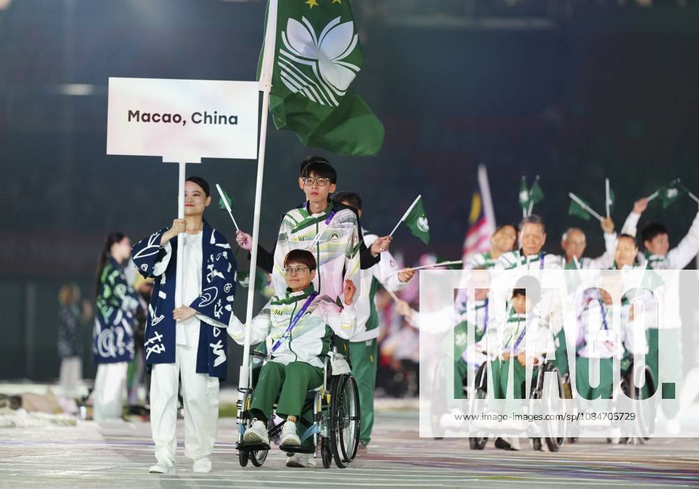 (261018) -- NAGOYA, Oct. 18, 2026 -- The delegation of China s Macao parades into the stadium during the opening ceremony of the Aichi-Nagoya Asian Para Games in Nagoya, Japan, Oct. 18, 2026. ) (SP)JAPAN-NAGOYA-ASIAN PARA GAMES-OPENING CEREMONY YaoxQilin