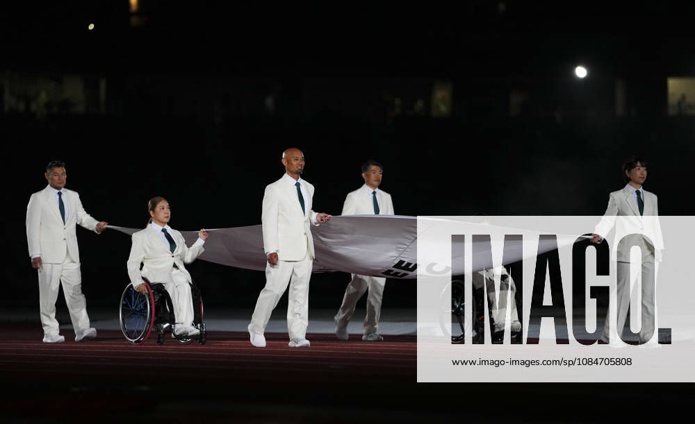 (261018) -- NAGOYA, Oct. 18, 2026 -- The flag of the Asian Paralympic Committee is carried during the opening ceremony of the Aichi-Nagoya Asian Para Games in Nagoya, Japan, Oct. 18, 2026. ) (SP)JAPAN-NAGOYA-ASIAN PARA GAMES-OPENING CEREMONY JiaxHaocheng
