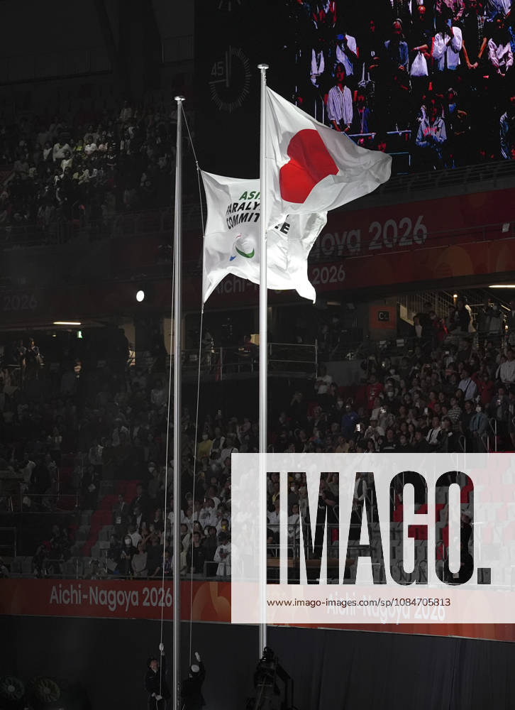 (261018) -- NAGOYA, Oct. 18, 2026 -- The flag of the Asian Paralympic Committee (L) and the Japanese national flag are raised during the opening ceremony of the Aichi-Nagoya Asian Para Games in Nagoya, Japan, Oct. 18, 2026. ) (SP)JAPAN-NAGOYA-ASIAN PARA GAMES-OPENING CEREMONY CaixYang