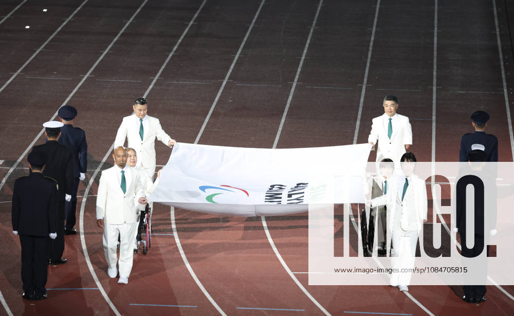 (261018) -- NAGOYA, Oct. 18, 2026 -- The flag of the Asian Paralympic Committee is carried during the opening ceremony of the Aichi-Nagoya Asian Para Games in Nagoya, Japan, Oct. 18, 2026. ) (SP)JAPAN-NAGOYA-ASIAN PARA GAMES-OPENING CEREMONY YaoxQilin
