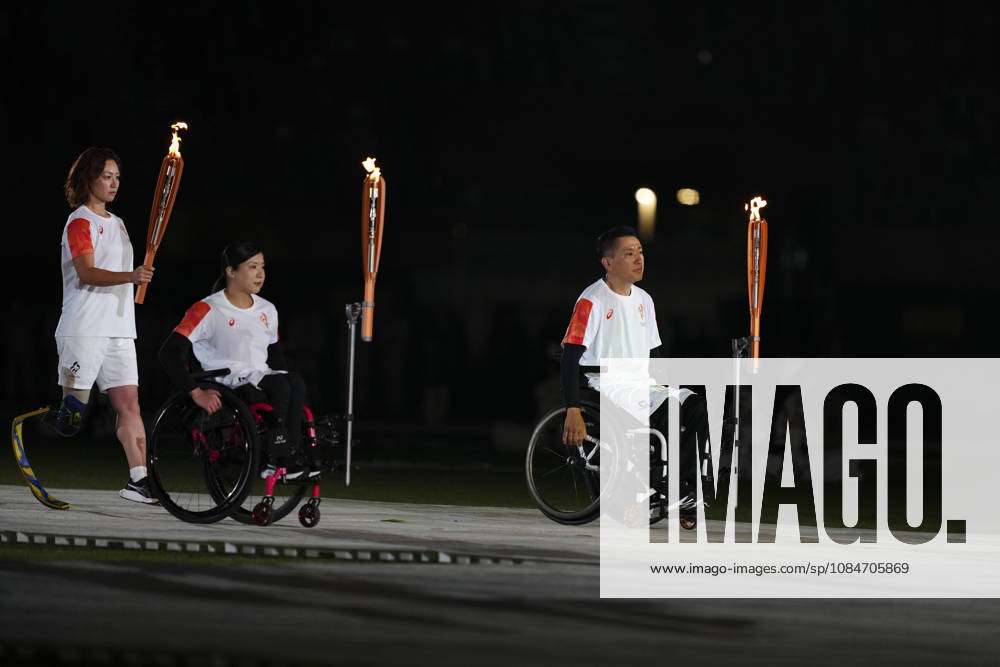 (261018) -- NAGOYA, Oct. 18, 2026 -- Torch bearers relay the torch during the opening ceremony of the Aichi-Nagoya Asian Para Games in Nagoya, Japan, Oct. 18, 2026. ) (SP)JAPAN-NAGOYA-ASIAN PARA GAMES-OPENING CEREMONY JiaxHaocheng