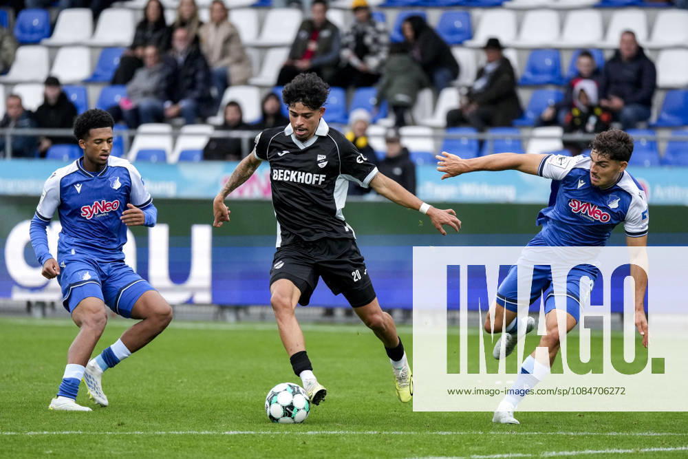 V li Natnael Abraha TSG II, 2, Andre Leipold Verl, 20, Sean Dulic TSG II, 3, tackle, game scene, duel, tackle, tackling, dynamics, action, 18 10 2026, Sinsheim, Germany, soccer, 3rd Division, TSG 1899 Hoffenheim II vs. SC Verl, DFB and DFL regulations prohibit any use of photographs as image sequences and or quasi-video
