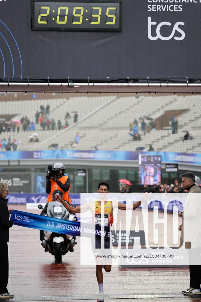 18th October 2026; Amsterdam, Netherlands; TCS Amsterdam Marathon; Noah Schutte of the Netherlands crosses the finish line as the fastest Dutch man, 25th overall, in a time of 2:09:35 AnthonyxBenoit