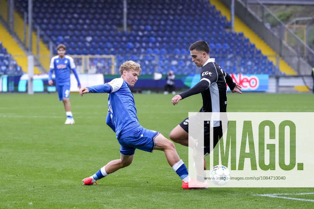 From left: Krystof Cizek (TSG II), 26; Almin Mesanovic (Verl), 30; tackle in front of empty stands; game scene; duel; tackle; tackling; dynamic; action; few spectators; October 18, 2026, Sinsheim, Germany, soccer, 3rd Division, TSG 1899 Hoffenheim II vs. SC Verl, DFB and DFL regulations prohibit any use of photographs as image sequences and or quasi-video