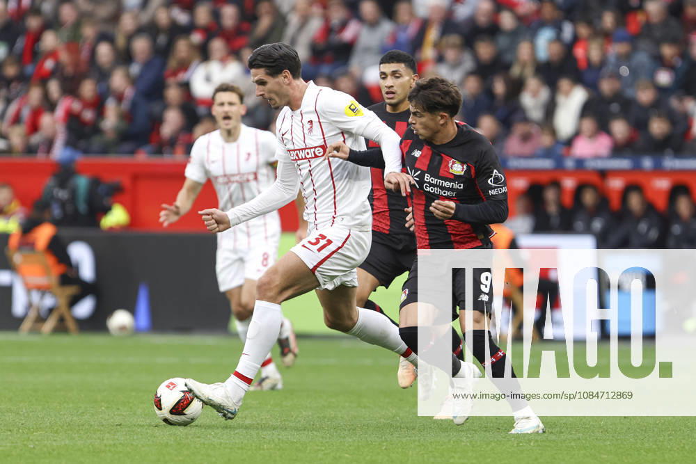 Igor Matanovic of SC Freiburg and Afonso Moreira of Bayer 04 Leverkusen battle for the ball during the Bundesliga match between Bayer 04 Leverkusen and Sport Club Freiburg at BayArena on October 18, 2026, in Leverkusen, Germany. Photo by Oliver Kaelke, DeFodi Images. Igor Matanovic of SC Freiburg and Afonso Moreira of Bayer 04 Leverkusen battle for the ball during the Bundesliga match between Bayer 04 Leverkusen and SC Freiburg at BayArena on October 18, 2026 in Leverkusen, Germany. Photo by Oliver Kaelke, DeFodi Images. DFB and DFL regulations prohibit any use of photographs as image sequences and or quasi-video. Photo by Oliver Kaelke, DeFodi Images.