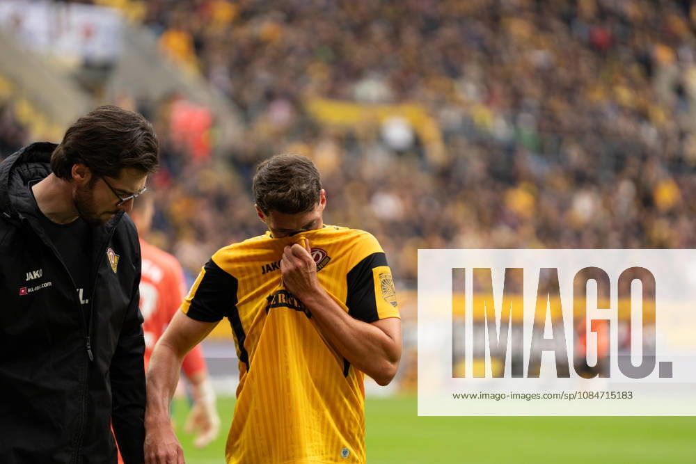 Pictured: Nicolai Rapp, 6, of SG Dynamo Dresden, is being helped off the field after an injury on October 18, 2026; SG Dynamo Dresden vs. 1. FC Magdeburg, Bundesliga Matchday 8, soccer, Germany, Dresden, Rudolf Harbig Stadium