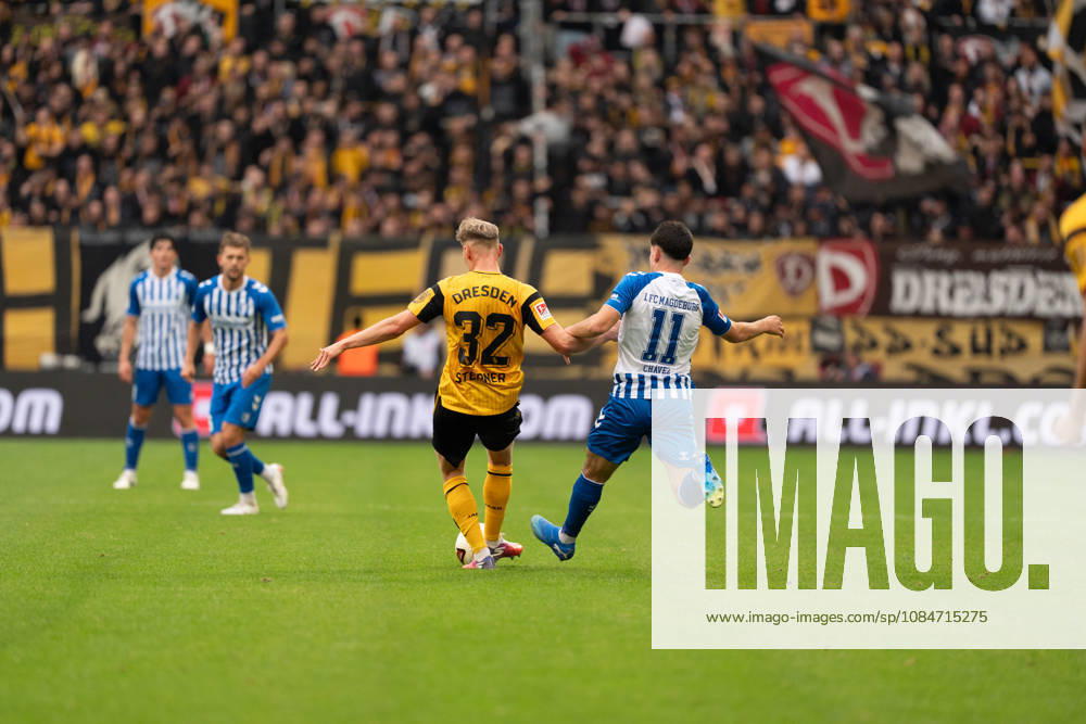Pictured: A tackle between Jonas Sterner (32), SG Dynamo Dresden, and Felipe Chavez (11), 1 FC Magdeburg, October 18, 2026, SG Dynamo Dresden vs. 1 FC Magdeburg, Bundesliga Matchday 8, Soccer, Germany, Dresden, Rudolf Harbig Stadium