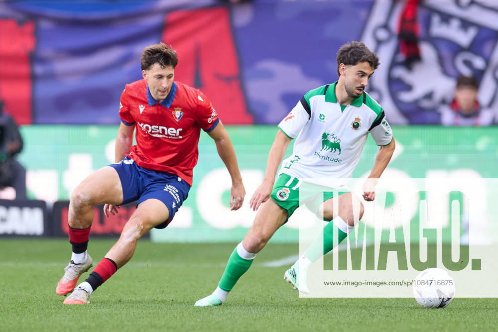 Abel Bretones of CA Osasuna competes for the ball with Andres Martin of Real Racing Club de Santander during the LaLiga EA Sports match between CA Osasuna and Real Racing Club de Santander at El Sadar on October 18, 2026, in Pamplona, Spain. CA Osasuna V Racing De Santander - LaLiga EA Sports - ZUMAa181 20261018_zaa_a181_131
