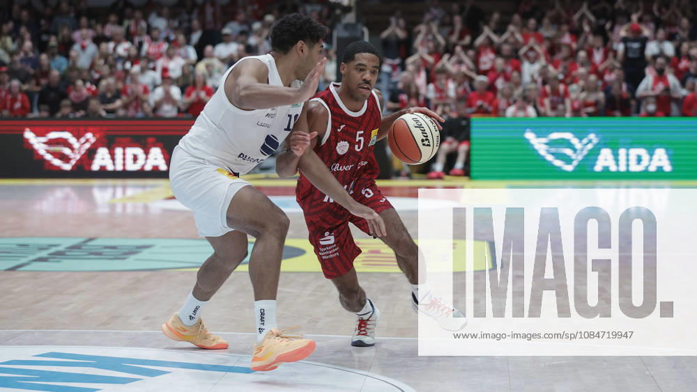 Pictured from left: Kostja Mushidi of Syntainics MBC, 10, against Kenny Dye of Wuerzburg Baskets, 5, with the ball, August 18, 2026, Fitness First Würzburg Baskets vs. SYNTAINICS MBC, Netto BBL Cup, Round of 16, Germany, 97072, tectake Arena Würzburg,
