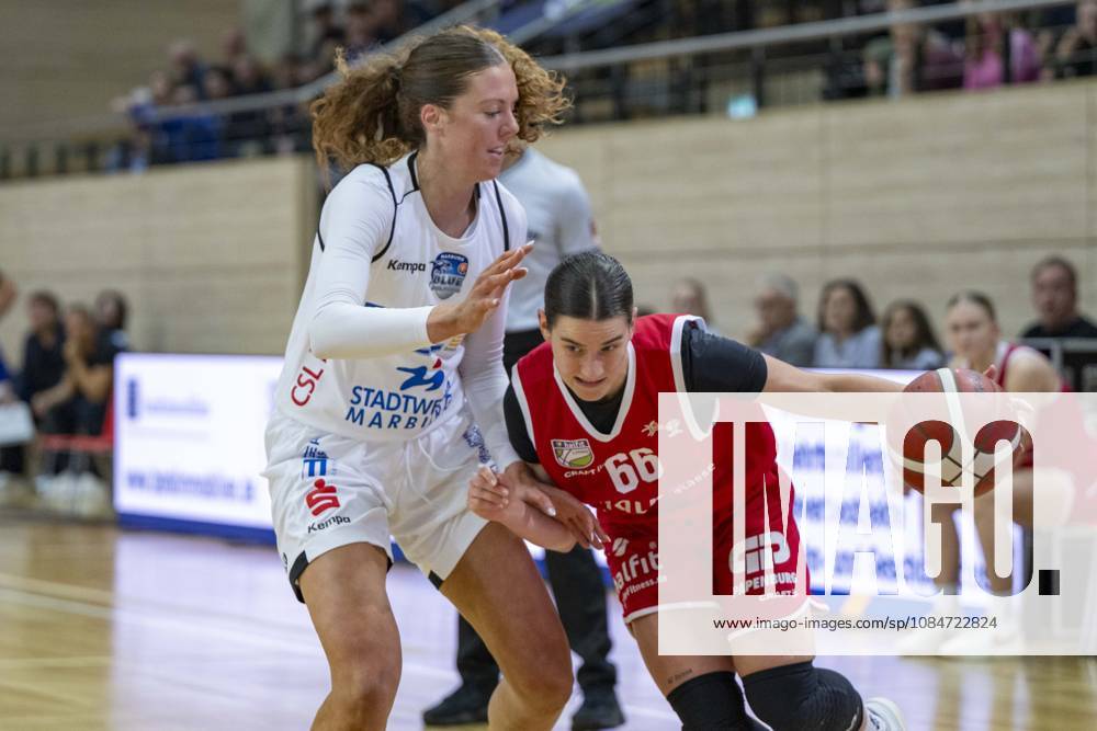 Toyota DBBL 2026–2027: HalFit Lions vs. BC Marburg, Halle an der Saale, Germany, October 18, 2026. Pictured, from left, in a one-on-one matchup: Amelia Hassett (Marburg) and Dominica Fiszer (Halle an der Saale), at the swh Arena in Saxony-Anhalt, Germany