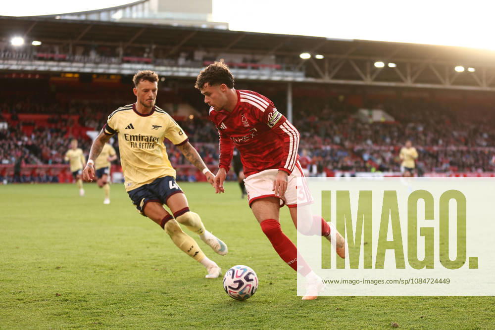 Nottingham, England, 18th October 2026. Ben White of Arsenal and Neco Williams of Nottingham Forest challenge for the ball during the Nottingham Forest vs Arsenal Premier League match at the City Ground, Nottingham. Picture credit should read: Jake Youle Sportimage . SPI_027_JY_Forest_Arsenal SPI-5083-0027