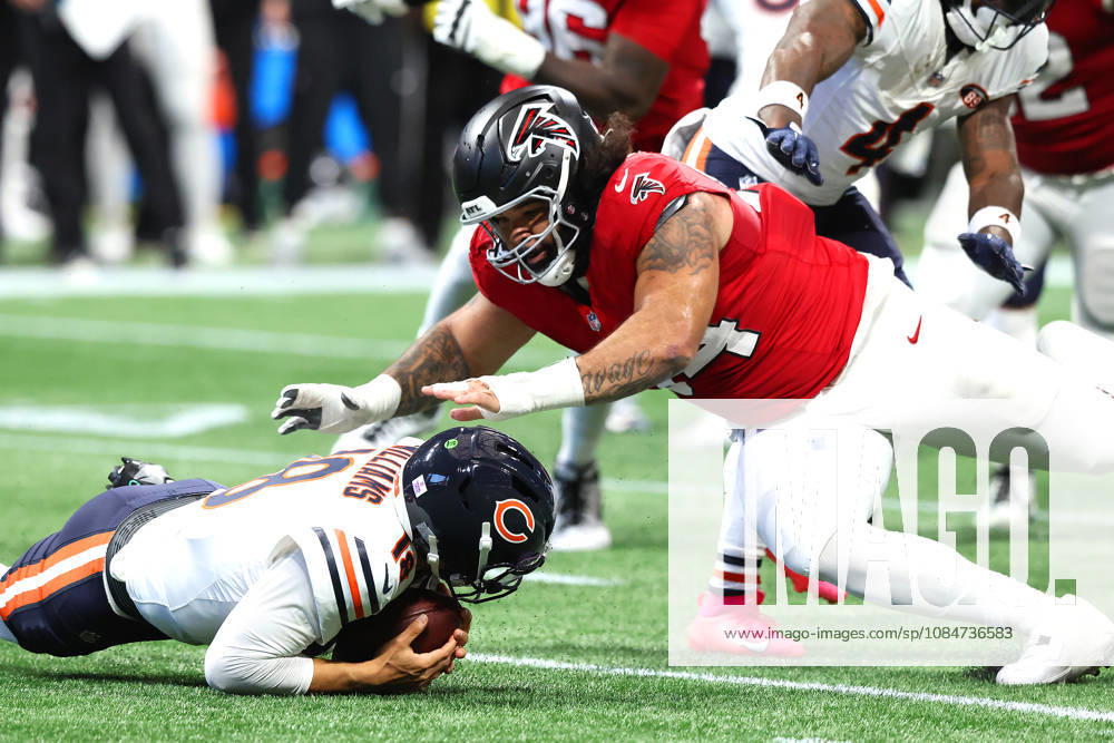 ATLANTA, GA - OCTOBER 18: LaCale London (94) of the Atlanta Falcons pounces on Caleb Williams (18) of the Chicago Bears after he fumbled the snap during the Sunday afternoon NFL, American Football Herren, USA game between the Atlanta Falcons and the Chicago Bears on October 18, 2026 at the Mercedes-Benz Stadium in Atlanta, GA. (Photo by David J. Griffin Icon Sportswire) NFL: OCT 18 Bears at Falcons Icon9532610180182