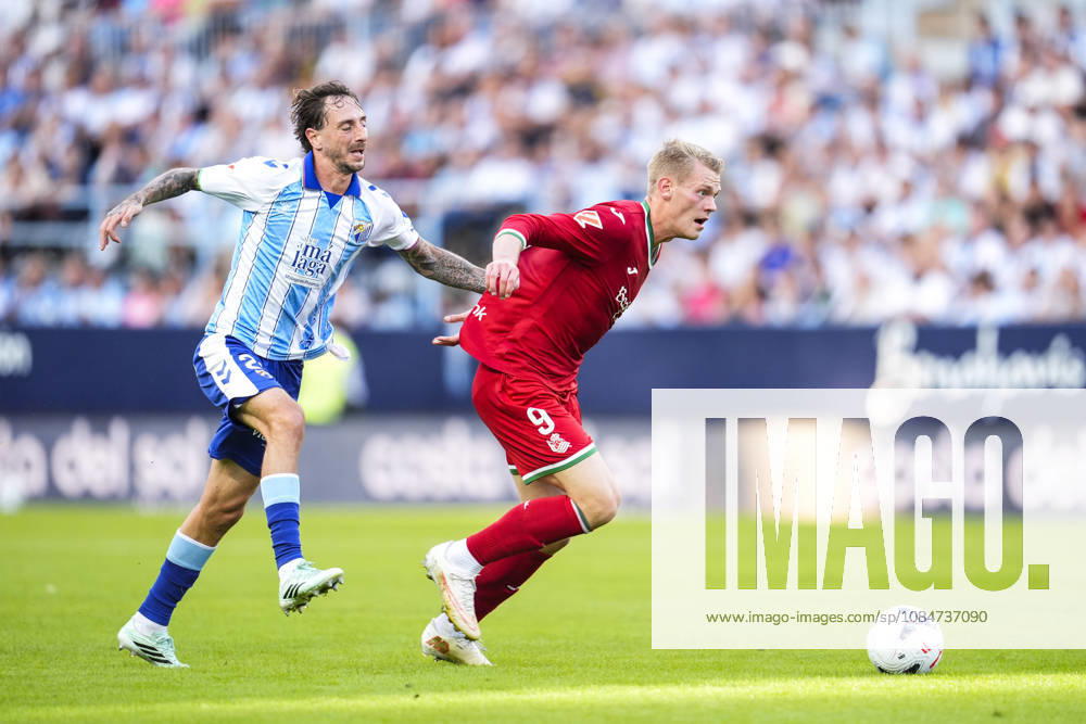 Orri Oskarsson of Real Sociedad and Fernando Calero of Malaga CF in action during the Spanish league, LaLiga EA Sports, football match played between Malaga CF and Real Sociedad at La Rosaleda stadium on October 18, 2026, in Malaga, Spain. Malaga CF V Real Sociedad - LaLiga EA Sports - ZUMAa181 20261018_zaa_a181_193