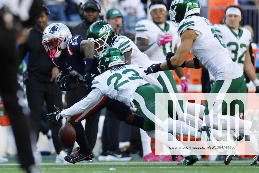 New England Patriots wide receiver DeMario Douglas, left, fumbles the ball during the second half against the New York Jets at Gillette Stadium in Foxborough, Massachusetts on Sunday, October 18, 2026. BOP20261018015 CJxGUNTHER