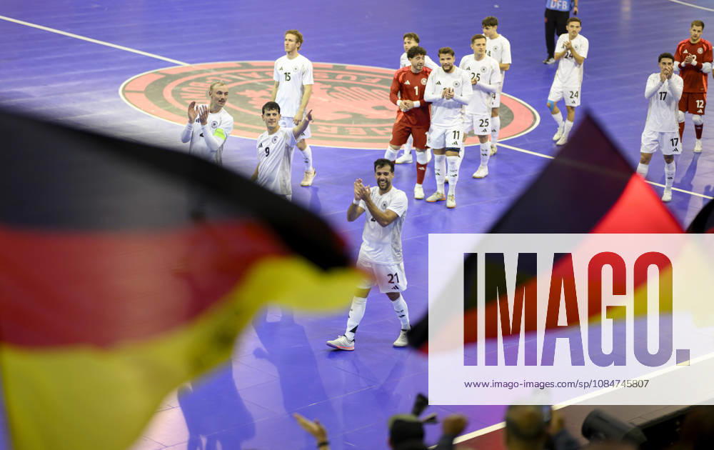Team Germany celebrates the final goal; victory lap; from left to right: Christopher Wittig (GER), Tomas Block (GER), Matias Block (GER). Futsal World Cup qualifying match: Germany vs. Lithuania, 4–2, on October 18, 2026, in Mülheim an der Ruhr, Germany, at the Westenergie Sporthalle.