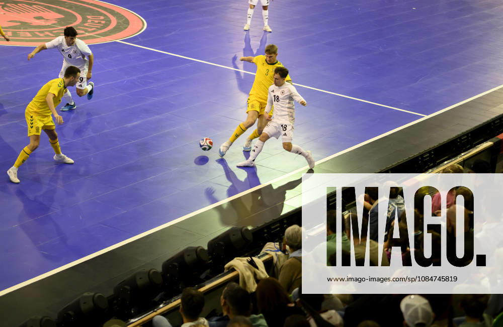 Theodoros Xydias (GER) vs. Ignas Rastutis (LIT), action, one-on-one, in front of spectators: Futsal World Cup Qualifier, Germany vs. Lithuania 4–2, on October 18, 2026, in Mülheim an der Ruhr, Germany, at the Westenergie Sporthalle