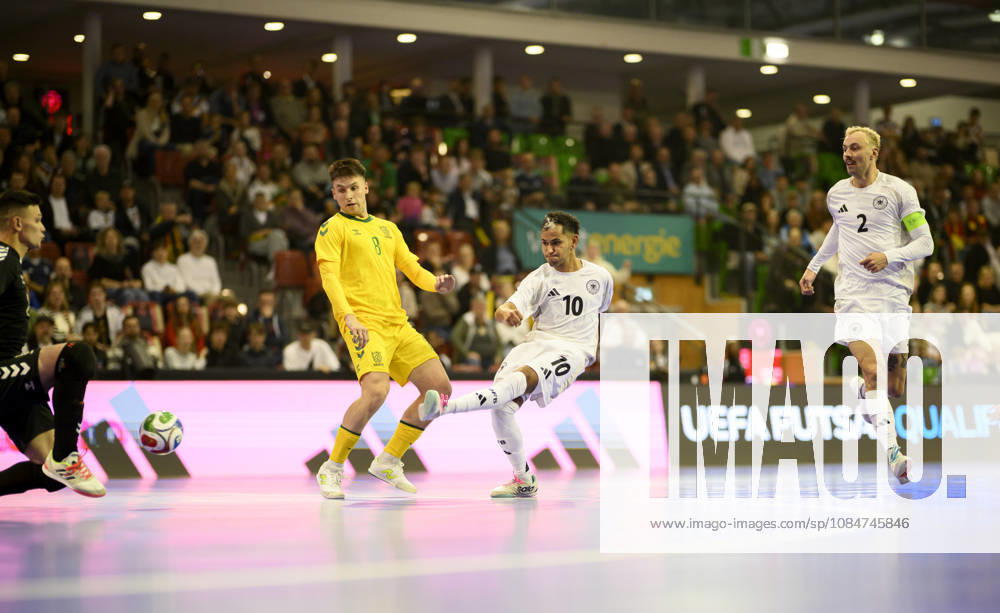 Scoring chance by Fouad Aghnima (GER) against goalkeeper Ernestas Macenis (L) and Albert Voskunovic (LIT), action, tackle, r Christopher Wittig (GER) Futsal World Cup Qualifier: Germany vs. Lithuania 4–2, on October 18, 2026, in Mülheim an der Ruhr, Germany, at the Westenergie Sporthalle