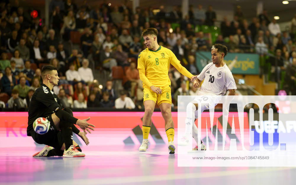 Scoring chance by Fouad Aghnima (GER) against goalkeeper Ernestas Macenis (L) and Albert Voskunovic (LIT), action, Tackle, Futsal World Cup Qualifier: Germany vs. Lithuania 4–2, on October 18, 2026, in Mülheim an der Ruhr, Germany, at the Westenergie Sporthalle