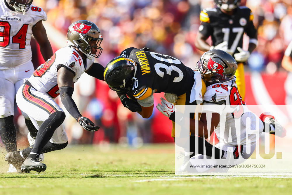 Tampa Bay Buccaneers defensive end ELIJAH ROBERTS (95) tackles Pittsburgh Steelers running back JAYLEN WARREN (30) during an NFL, American Football Herren, USA football game between the Pittsburgh Steelers and the Tampa Bay Buccaneers on Sunday, October 18, 2026, at Raymond James Stadium in Tampa, Florida. Tampa USA - ZUMAs335 20261018_znp_s335_033