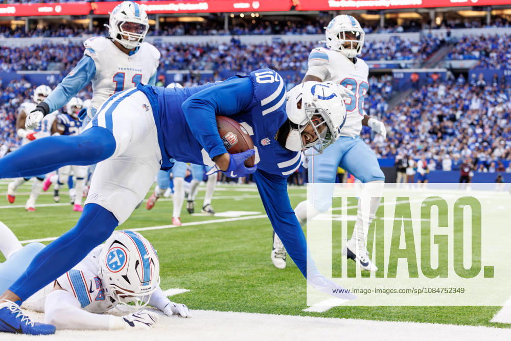 Indianapolis, Indiana, U.S: Indianapolis Colts wide receiver Keenan Allen (10) is knocked out at the six yard line by Tennessee Titans defensive back Marcus Harris (26) during the game between the Tennessee Titans and the Indianapolis Colts at Lucas Oil Stadium, Indianapolis, Indiana. Indianapolis U.S - ZUMAs304 20261018_zaf_s304_010