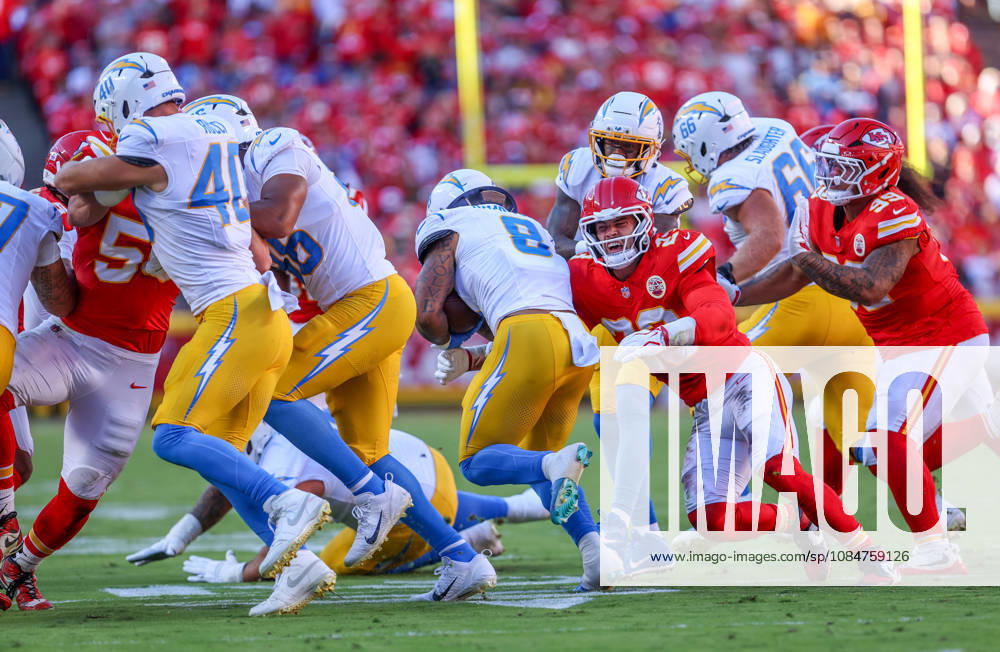 Oct 18, 2026: Los Angeles Chargers running back Omarion Hampton (8) gets tackled by Kansas City Chiefs linebacker Drue Tranquill (23) in Kansas City, MO, USA; at Arrowhead Stadium. Mandatory Credit: -Cal Media NFL, American Football Herren, USA 2026: Chargers Vs Chiefs OCT 18 - ZUMAc04_ 20261018_zma_c04_222