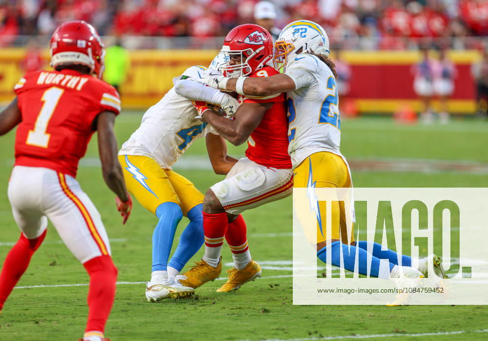 Oct 18, 2026: Kansas City Chiefs running back Kenneth Walker (9) gets tackled by Los Angeles Chargers safety Genesis Smith (22) in Kansas City, MO, USA; at Arrowhead Stadium. Mandatory Credit: -Cal Media Kansas City USA - ZUMAc04_ 20261018_zma_c04_219