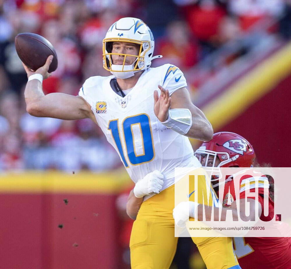 Los Angeles Chargers quarterback JUSTIN HERBERT (10) is pressured into throwing an interception after getting pressure from Kansas City Chiefs defensive end ASHTON GILLOTTE (97) during the first half on Sunday at Arrowhead Stadium in Kansas City. Kansas City USA - ZUMAm67_ 20261018_zaf_m67_003