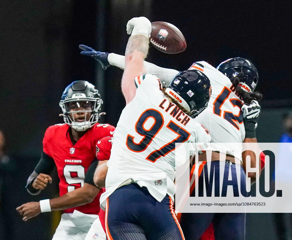 Chicago Bears defensive linebacker James Lynch (97) and Devin Bush (12) block a pass thrown by Atlanta Falcons quarterback Michael Penix Jr (9) during the game at Mercedes-Benz Stadium. NFL, American Football Herren, USA Chicago Beras At Atlanta Falcons - ZUMAw109 20261018_fap_w109_013