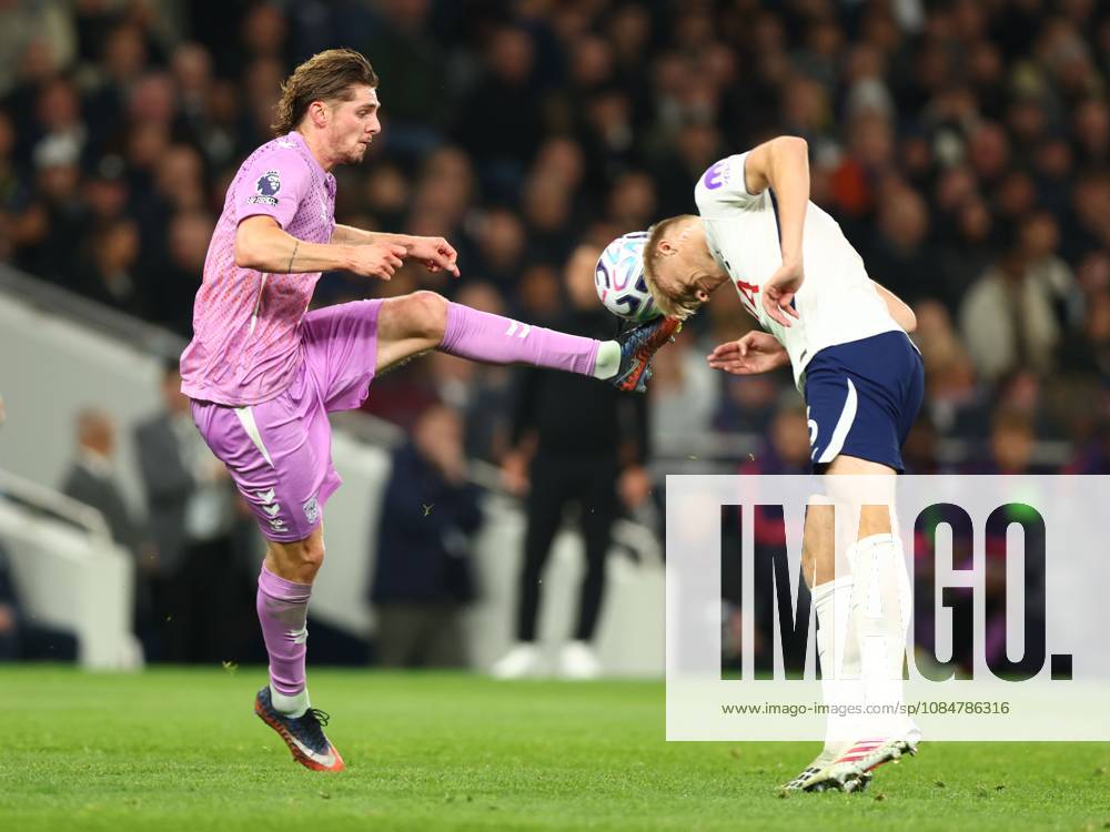 Matt Grimes of Coventry City kicks the ball as Jan Paul van Hecke of Tottenham Hotspur heads the ball. Tottenham Hotspur v Coventry City, Premier League, Football, Tottenham Hotspur Stadium, London, UK - 19 Oct 2026London Tottenham Hotspur Stadium United Kingdom