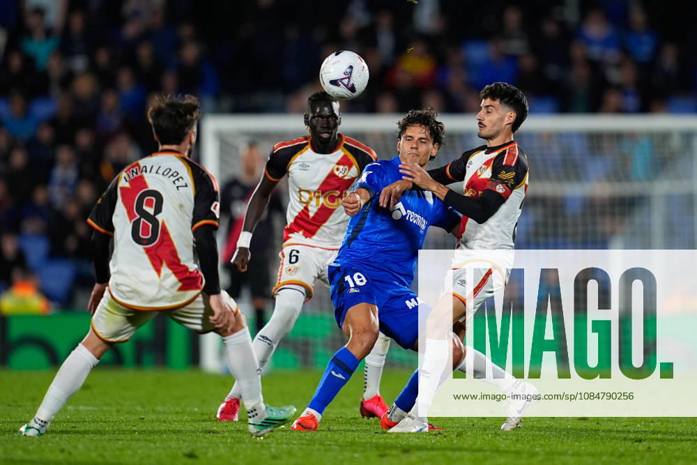 Enes Unal of Getafe CF and Oscar Valentin of Rayo Vallecano compete for the ball during the Spanish League, LaLiga EA Sports, football match between Getafe CF and Rayo Vallecano at Coliseum de Getafe stadium on October 19, 2026, in Getafe, Spain. Getafe Spain - ZUMAa181 20261019_zaa_a181_064