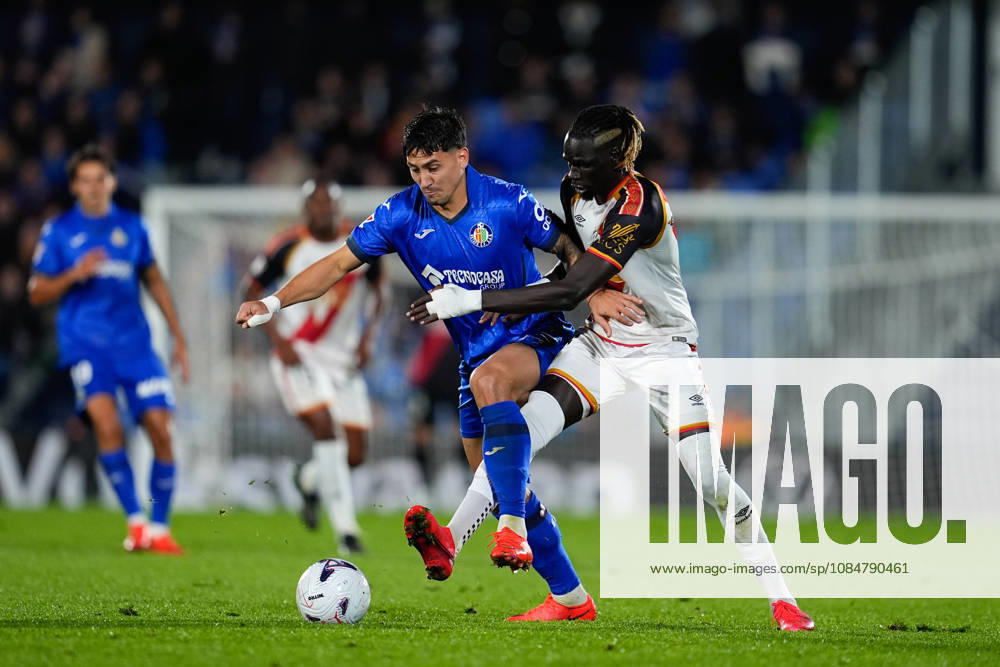 Martin Satriano of Getafe CF and Pathe Ciss of Rayo Vallecano compete for the ball during the Spanish League, LaLiga EA Sports, football match between Getafe CF and Rayo Vallecano at Coliseum de Getafe stadium on October 19, 2026, in Getafe, Spain. Getafe Spain - ZUMAa181 20261019_zaa_a181_093
