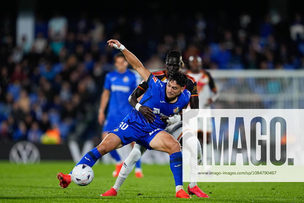 Martin Satriano of Getafe CF and Pathe Ciss of Rayo Vallecano compete for the ball during the Spanish League, LaLiga EA Sports, football match between Getafe CF and Rayo Vallecano at Coliseum de Getafe stadium on October 19, 2026, in Getafe, Spain. Getafe Spain - ZUMAa181 20261019_zaa_a181_097