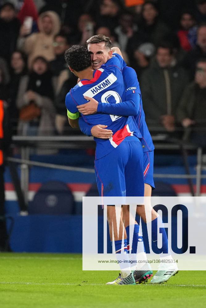 Fabian Ruiz of PSG is congratulated by Achraf Hakimi of PSG after he puts his side 4-2 ahead Paris Saint-Germain v Barcelona, UEFA Champions League, Football, Parc des Princes, Paris, France - 20 Oct 2026Paris Parc des Princes France