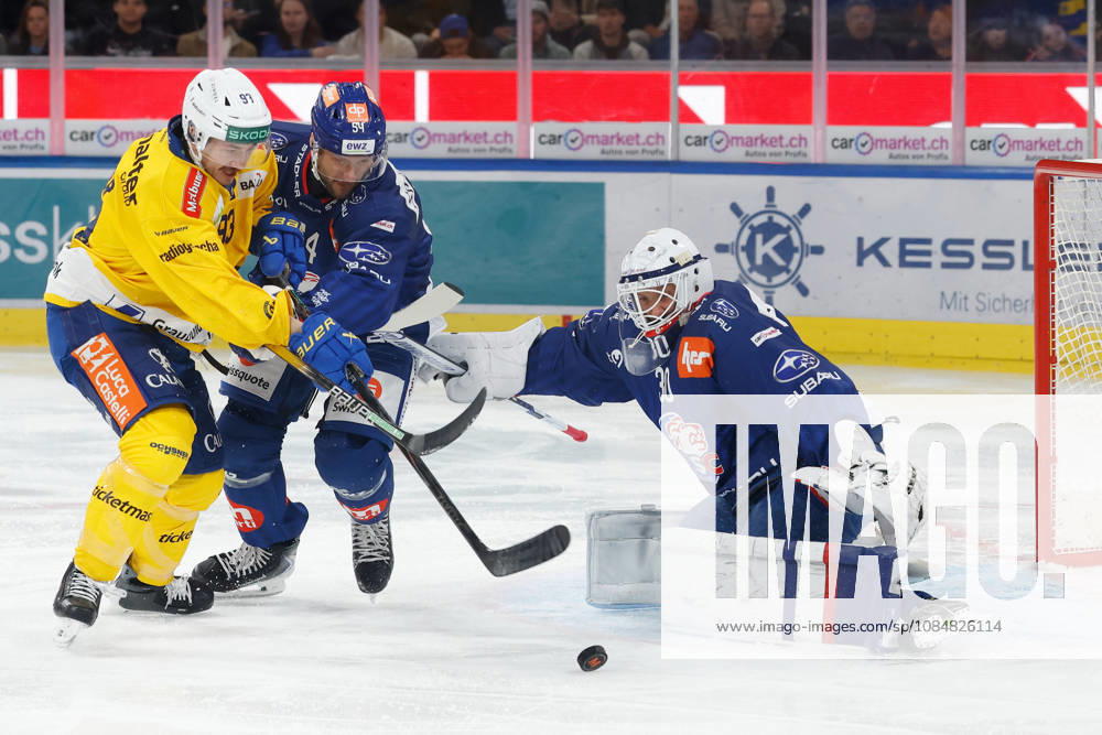 Swiss Life Arena, Zurich, SWITZERLAND, 2026–2027 Season, Men s Ice Hockey National League, ZSC Lions vs. HC Davos: Yannick Frehner (left), HC Davos, against Christian Marti (ZSC), in front of ZSC goaltender Simon Hrubec