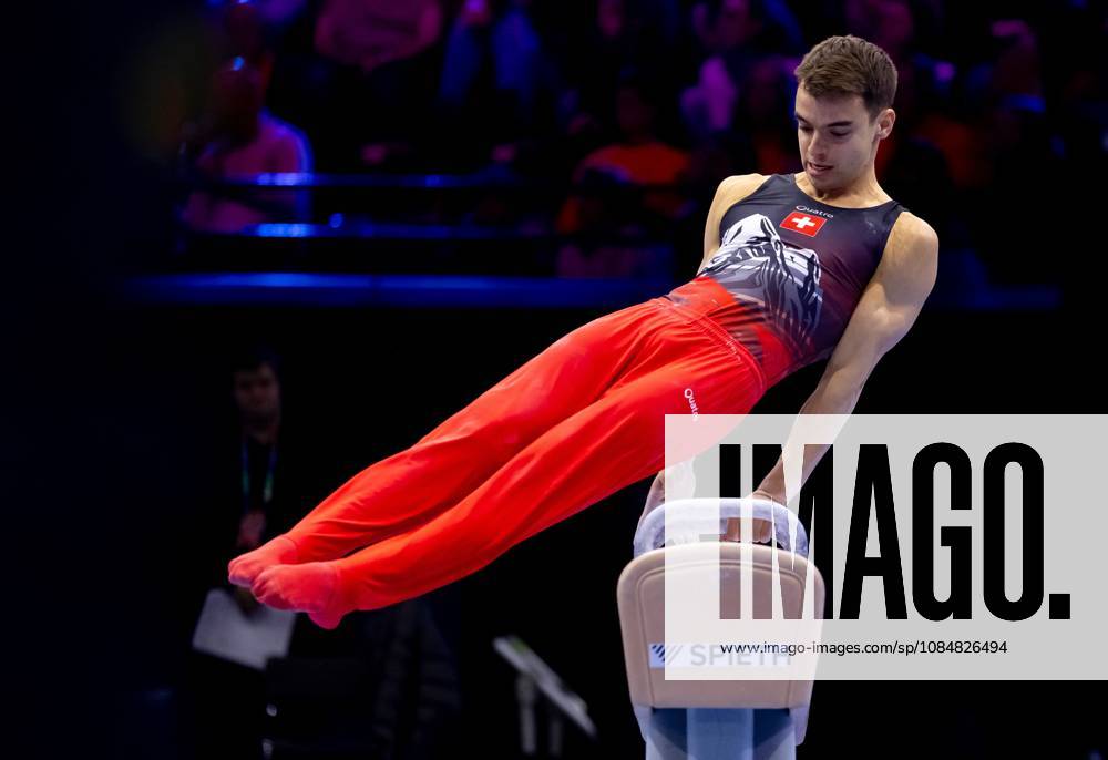 ROTTERDAM - Dominic Tamsell (SUI) in action during the men s team final at the World Gymnastics Championships in Rotterdam Ahoy. IRIS VAN DEN BROEK ANP ANPxSportx IVx 573106300 originalFilename: 573106300