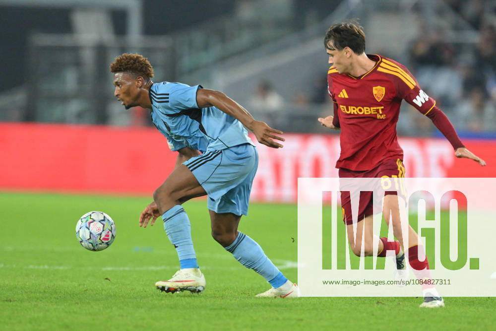 SOCCER - UEFA Champions League - AS Roma vs. Slovan Bratislava Photo by IPA ABACAPRESS.COM89963769 - Rahim Ibrahim of Slovan Bratislava under pressure from Niccolo Pisilli of Roma during the UEFA Champions League soccer match between Roma and Slovan Bratislava at the Olimpico Stadium on October 20, 2026, in Rome, Lazio. During the AS Roma vs. Slovan Bratislava UEFA Champions League soccer match in Rome, Italy, on October 20, 2026 Rome Italy