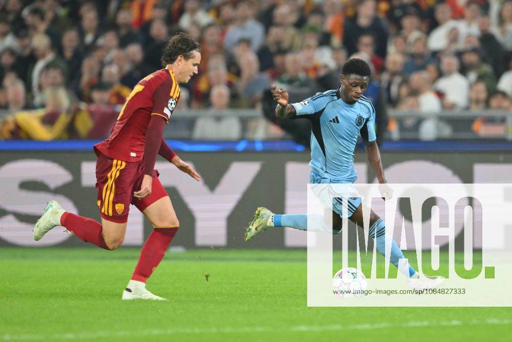 SOCCER - UEFA Champions League - AS Roma vs. Slovan Bratislava Photo by IPA ABACAPRESS.COM89963800 - Daniele Ghilardi of Roma under pressure from Suleiman Camara of Slovan Bratislava during the UEFA Champions League soccer match between Roma and Slovan Bratislava at the Olimpico Stadium on October 20, 2026, in Rome, Lazio. During the AS Roma vs. Slovan Bratislava UEFA Champions League soccer match in Rome, Italy, on October 20, 2026 Rome Italy