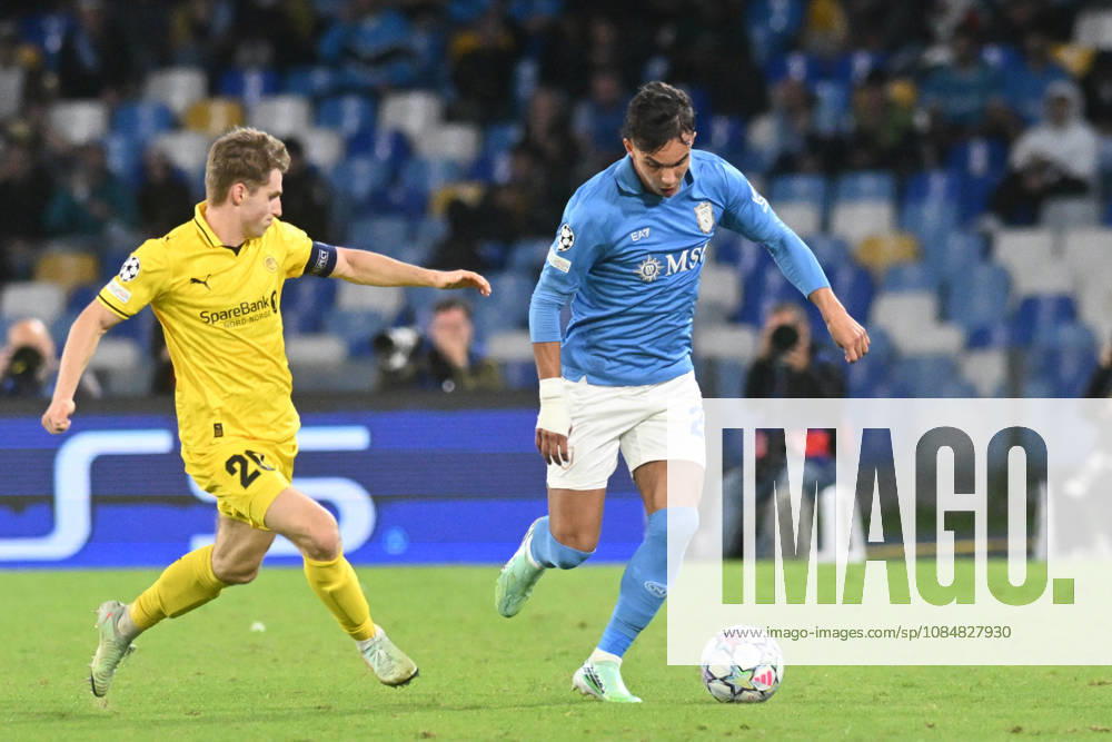 IPA89967118 - Hakon Evjen of Bodo Glimt battles for the ball with Giovane of SSC Napoli during the UEFA Champions League match between SSC Napoli and Bodo Glimt at Diego Armando Maradona Stadium