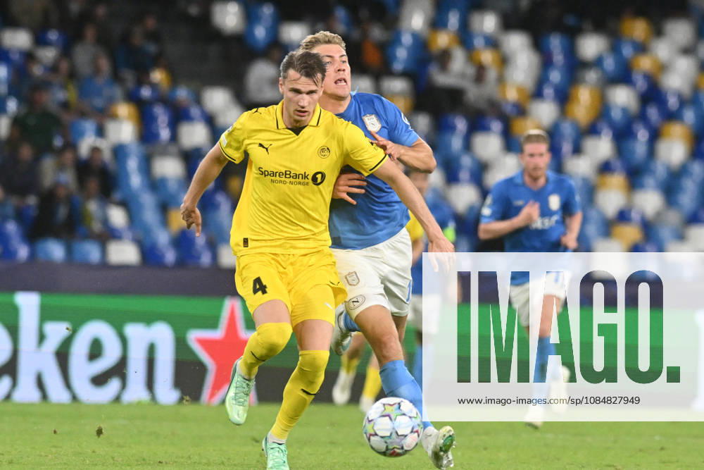 IPA89967090 - Odin Bjortuft of Bodo Glimt battles for the ball with Rasmus Hojlund of SSC Napoli during the UEFA Champions League match between SSC Napoli and Bodo Glimt at Diego Armando Maradona Stadium