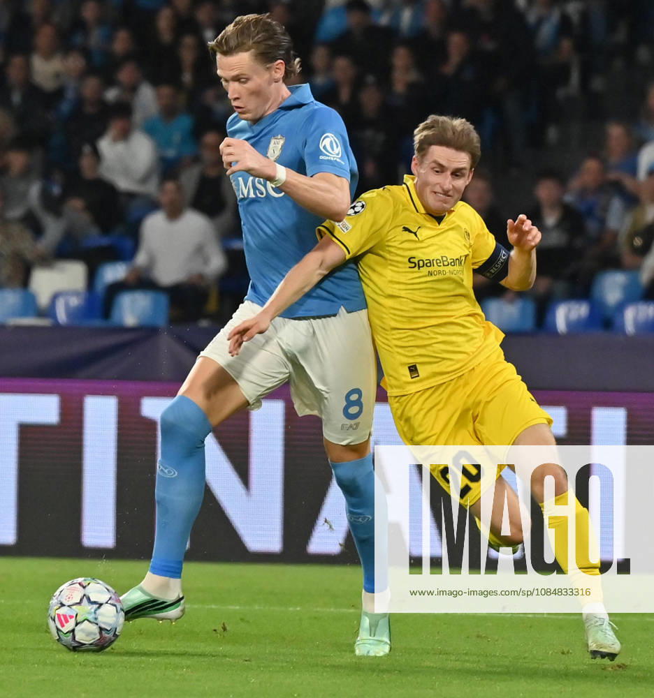 (261021) -- NAPLES, Oct. 21, 2026 -- Napoli s Scott McTominay (L) vies with Bodo Glimt s Fredrik Sjovold during the UEFA Champions League football match between Napoli and Bodo Glimt in Naples, Italy, Oct. 20, 2026. (Photo by Xinhua) (SP)ITALY-NAPLES-FOOTBALL-UEFA CHAMPIONS LEAGUE-NAPOLI VS BODO GLIMT AugustoxCasasoli