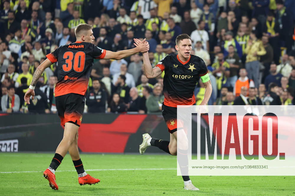 (261021) -- ISTANBUL, Oct. 21, 2026 -- Wiktor Nowak (L) of SK Slavia Prague and his teammates celebrate a goal during the UEFA Champions League football match between Fenerbahce and SK Slavia Praha in Istanbul, T¨¹rkiye, on Oct. 20, 2026. (Photo by Xinhua) (SP)T?RKIYE-ISTANBUL-UEFA CHAMPIONS-FENERBAHCE-SK SLAVIA PRAHA MustafaxKaya