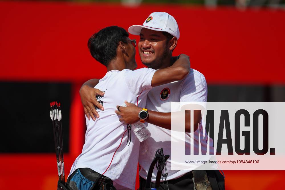 Indonesia Wins Silver in Mens Compound Doubles Para Archery OKAZAKI, JAPAN OCTOBER 21, 2026: Indonesian para archers Ken Swagumilang (right) and Arif Firmansyah (left) react after competing against Thailands Teerasak Phiarthanee and Comsan Singpirom in the mens compound doubles final at the 5th Asian Para Games Aichi-Nagoya 2026. The Indonesian pair lost 150-147 and won the silver medal. Okazaki Aichi Jepang